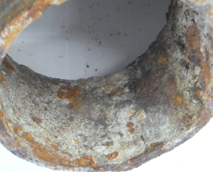 Corroded cast iron pipe
